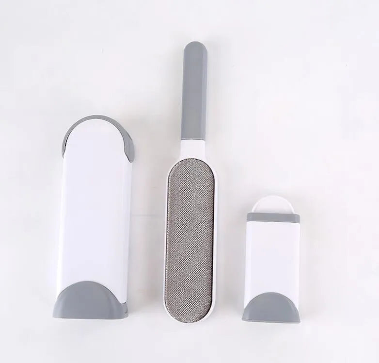 Blue reusable pet hair removal brush with self-cleaning base for sofas and upholstery.