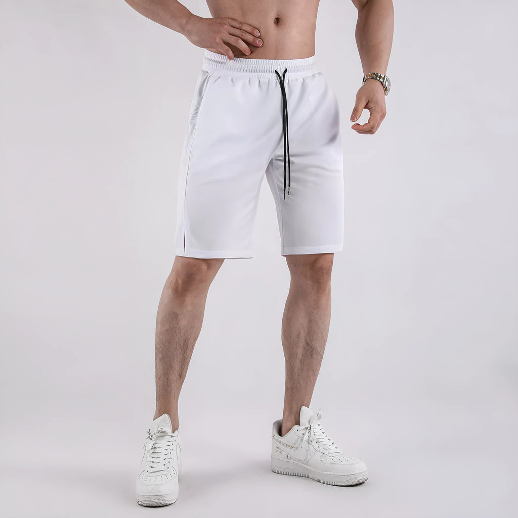 Men's quick-drying mesh shorts in black or white with elastic waist and loose casual fit for summer wear