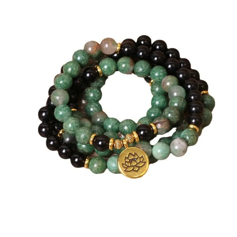 Green and black alloy elastic beaded bracelet with natural style design