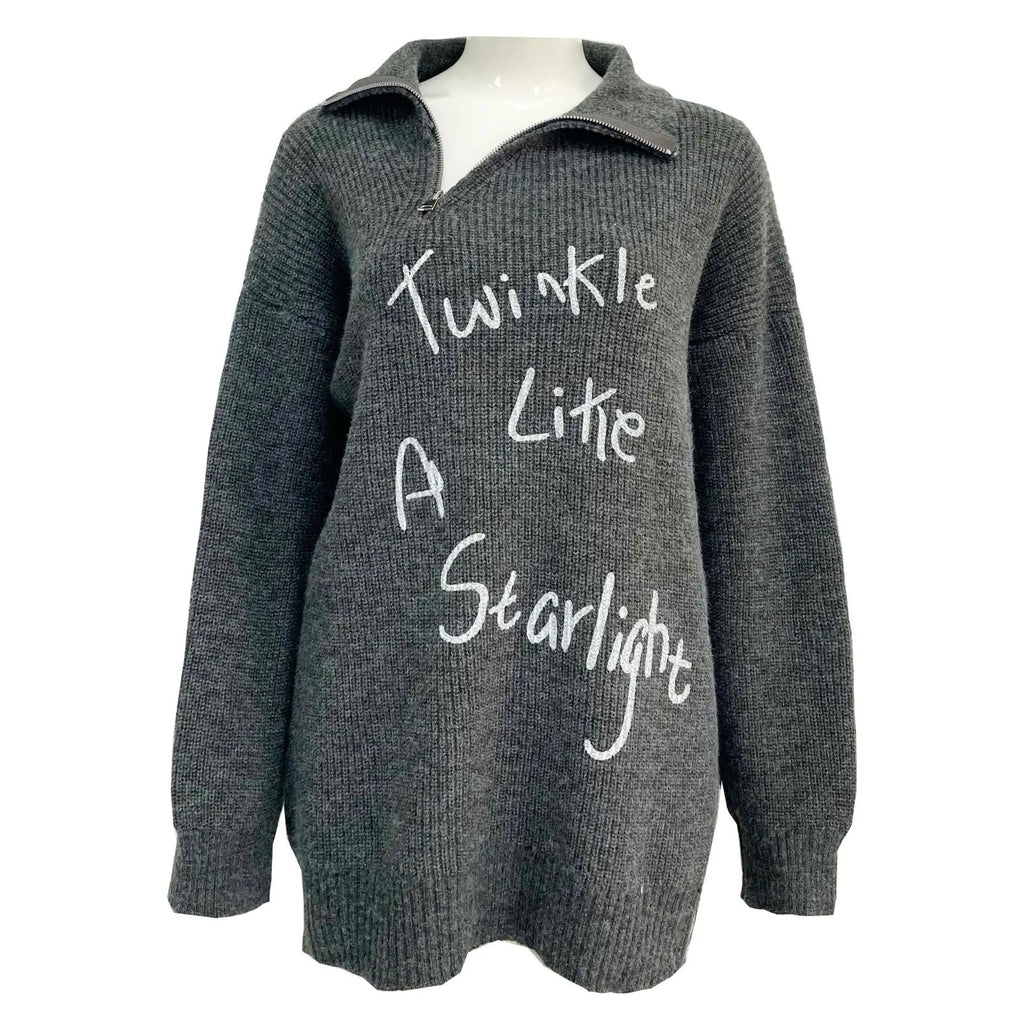 Light khaki women's alpaca fleece pullover sweater with an oblique zipper and retro turtleneck.