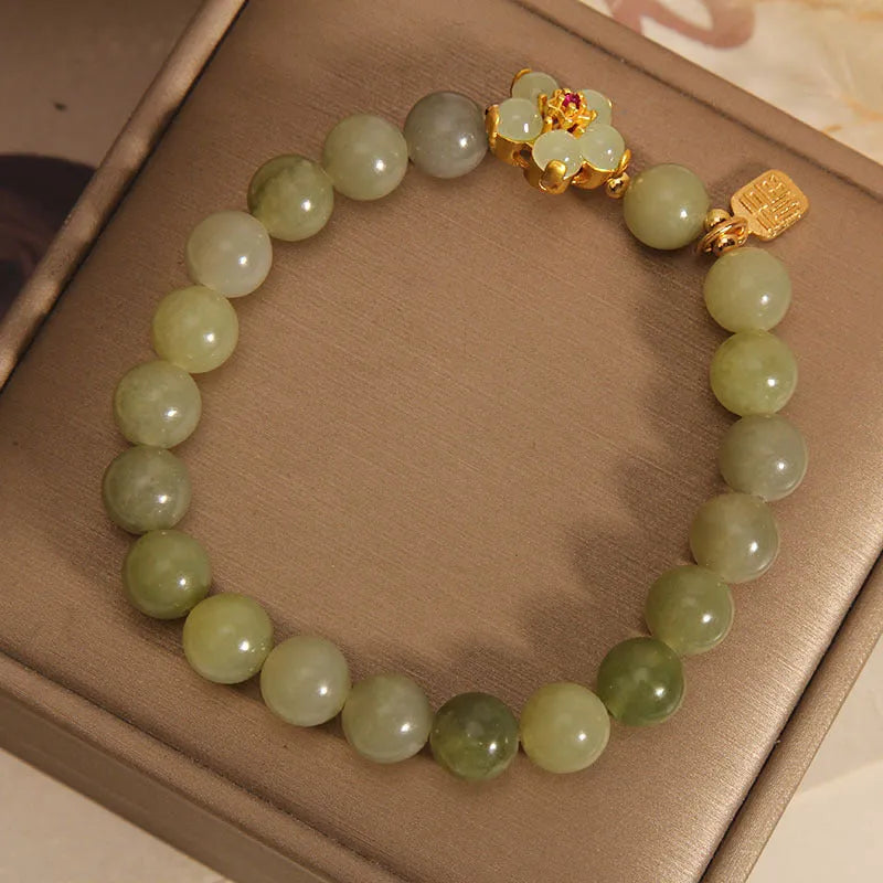Women's casual alloy bracelet with grey jade stone accent on wrist