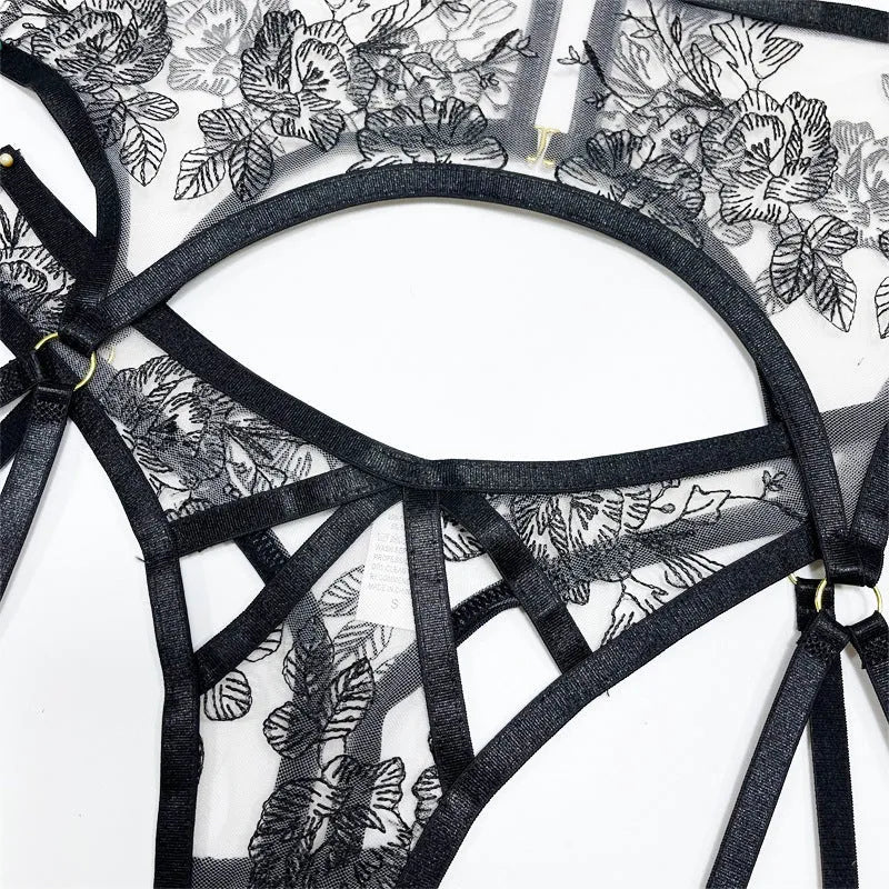 Black lace mesh three-piece set with floral print showing V-neck top, high-waisted pants, and waist ring