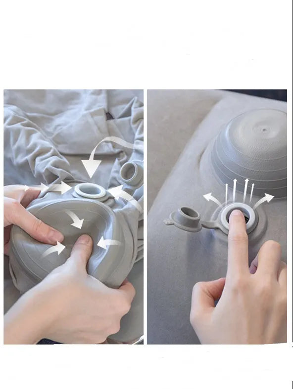Gray inflatable foot pad with push-on button and adjustable storage bag containing travel accessories