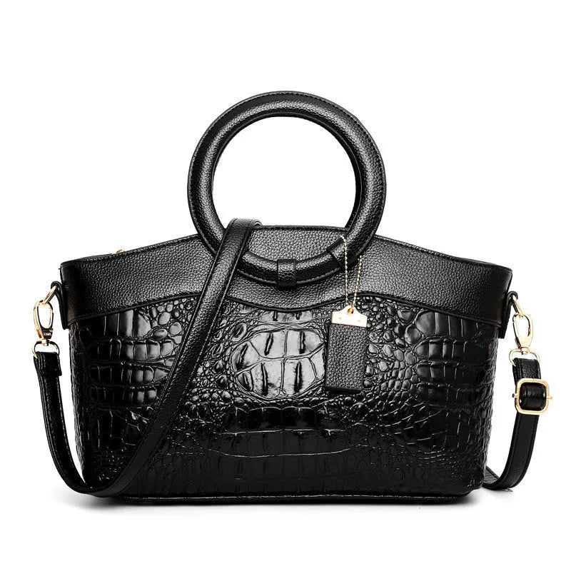 Fabric ladies handbag in multiple colours showing zipper compartment and internal organisation pockets