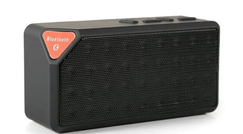 Cannon X3 small cube-shaped wireless Bluetooth speaker in black, blue, green, red, and yellow colour options.
