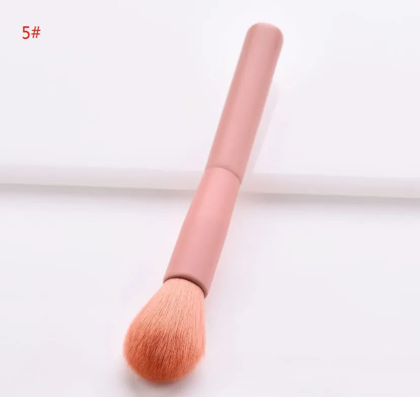 10-piece wooden handle makeup brush set with nylon bristles in a storage case.