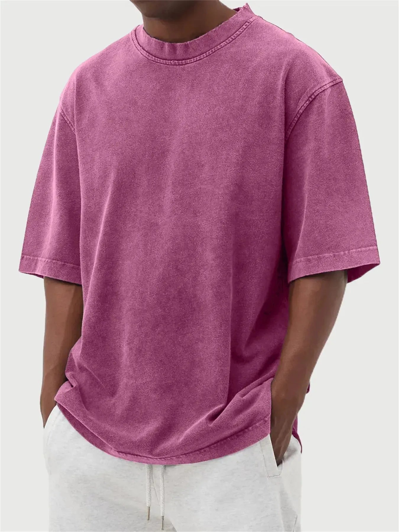 Men's loose fit distressed pullover t-shirt in stone washed polyester showing half sleeve design