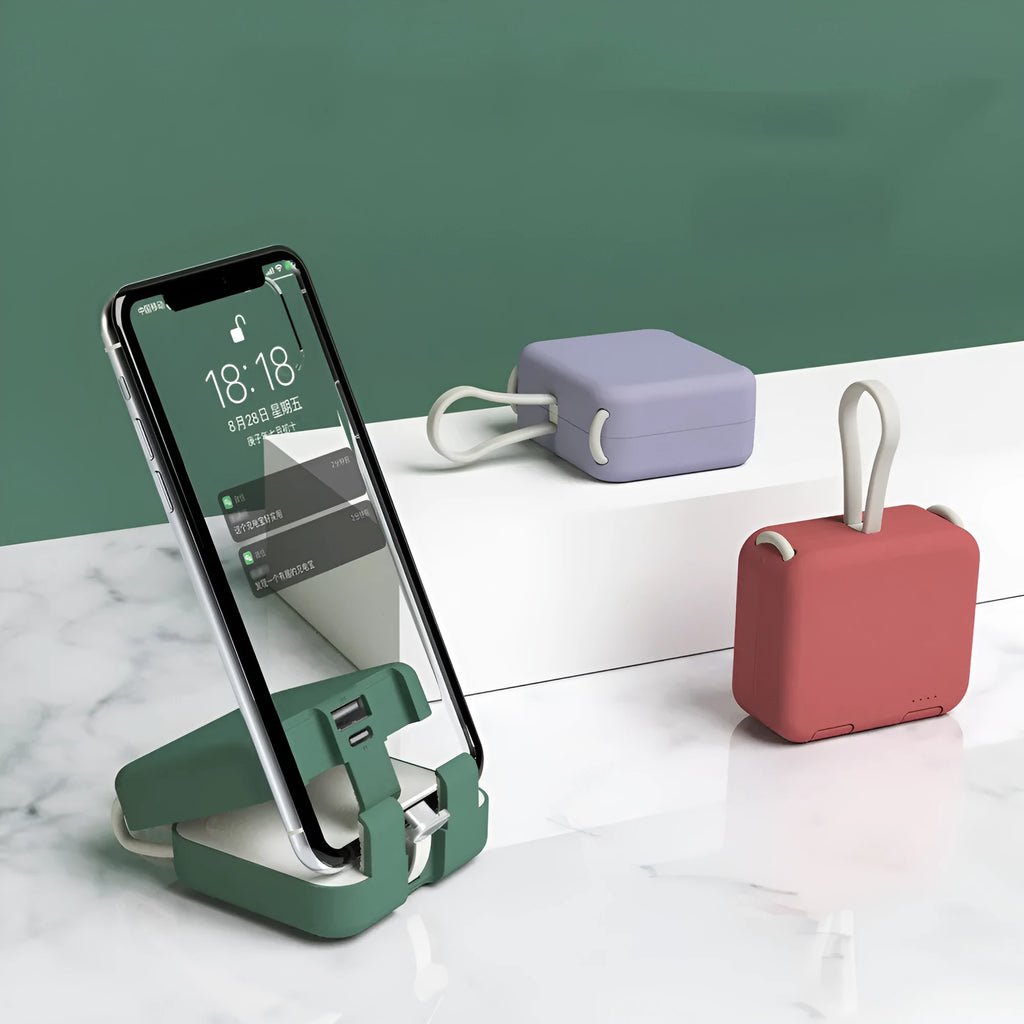 Handbag back clip power bank in blue showing USB-A and Type-C ports and integrated phone stand function.