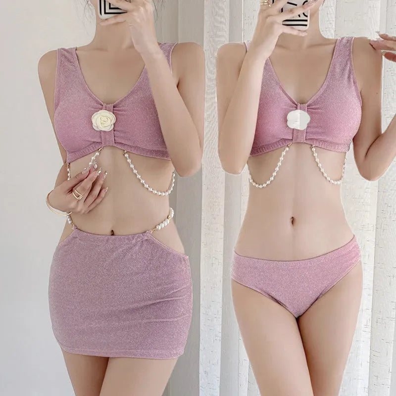 Bear Vacation pink and black three-piece polyester bikini set for swimming.
