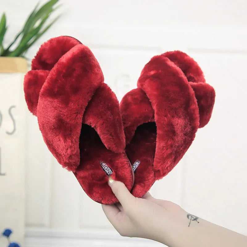 Cross open-toe fur slippers in pink with a patterned non-slip sole.