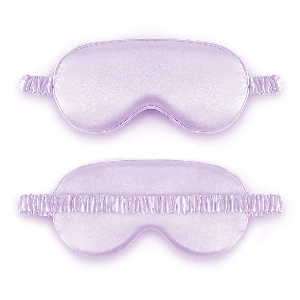 Reversible silk-like sleep eyeshade shown in multiple colour options including sky blue, wine red, and black.
