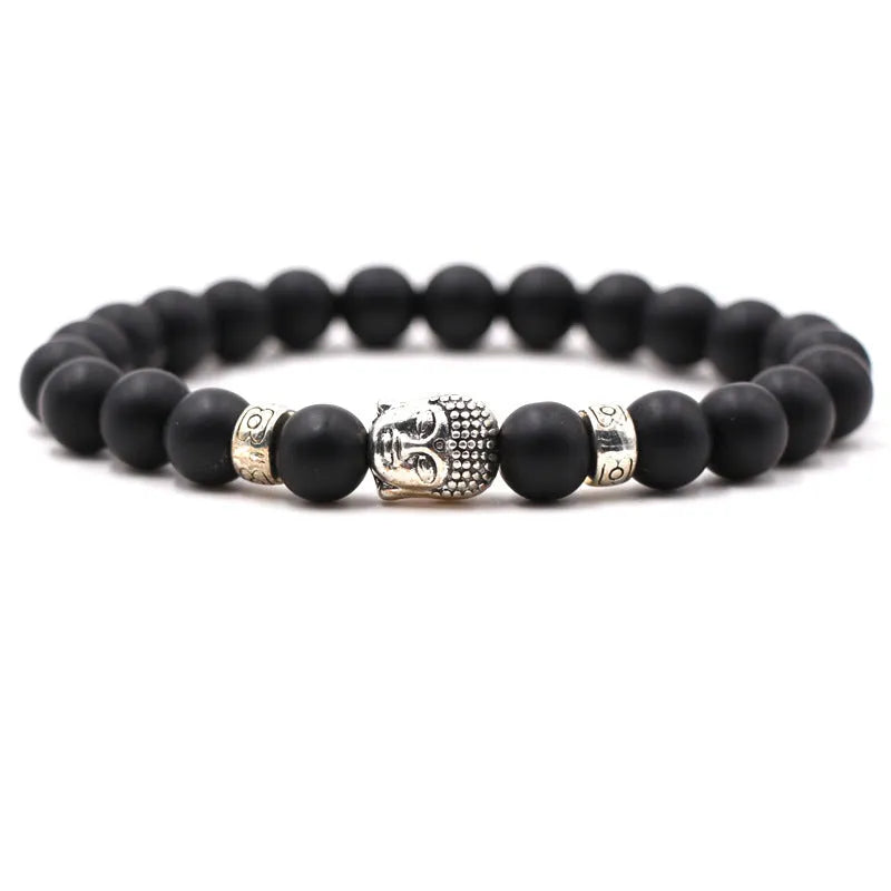 Natural stone stretch bracelet with tigereye, volcanic rock and turquoise beads on wrist