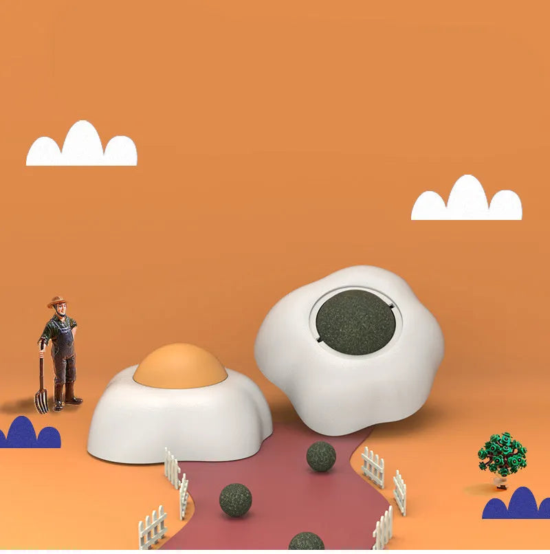 Organic catnip ball toy in fried egg and poached egg designs with wall mount capability