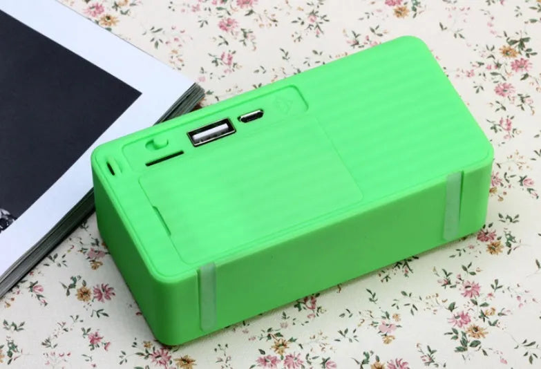 Cannon X3 small cube-shaped wireless Bluetooth speaker in black, blue, green, red, and yellow colour options.