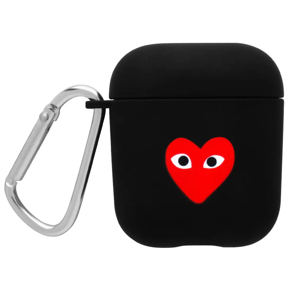 Black and pink Apple AirPods protective case with decorative back cover showing flower and smiley face designs