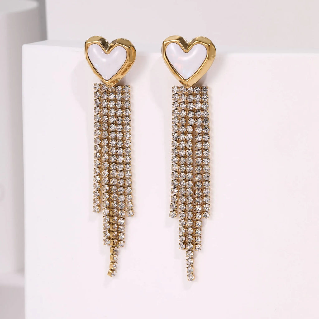 Women's stainless steel earrings with gold plated heart and star shapes in an irregular geometric design.