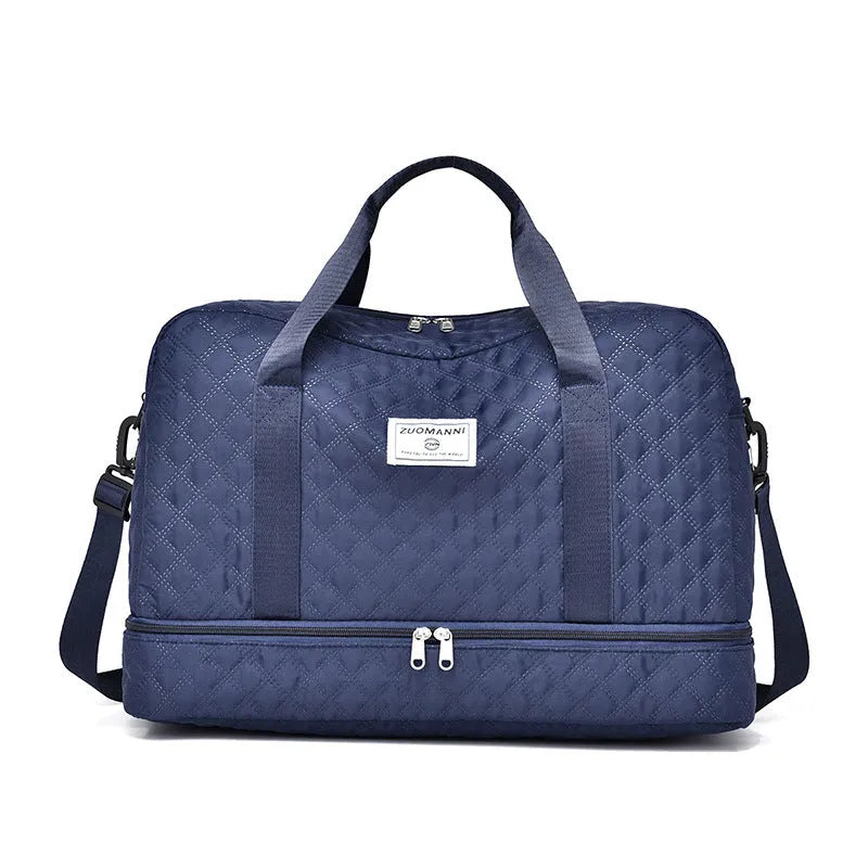 Large Oxford cloth leisure travel bag in a solid colour with sewing thread detail, shown in a 36-55L capacity size.