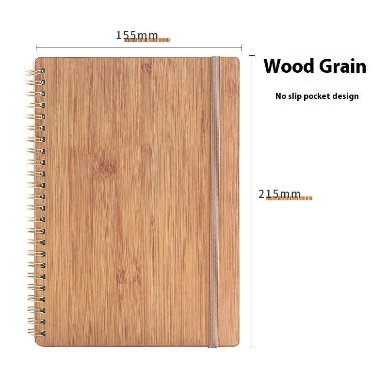 A5 erasable coil notebook with stone paper and pen on wooden surface