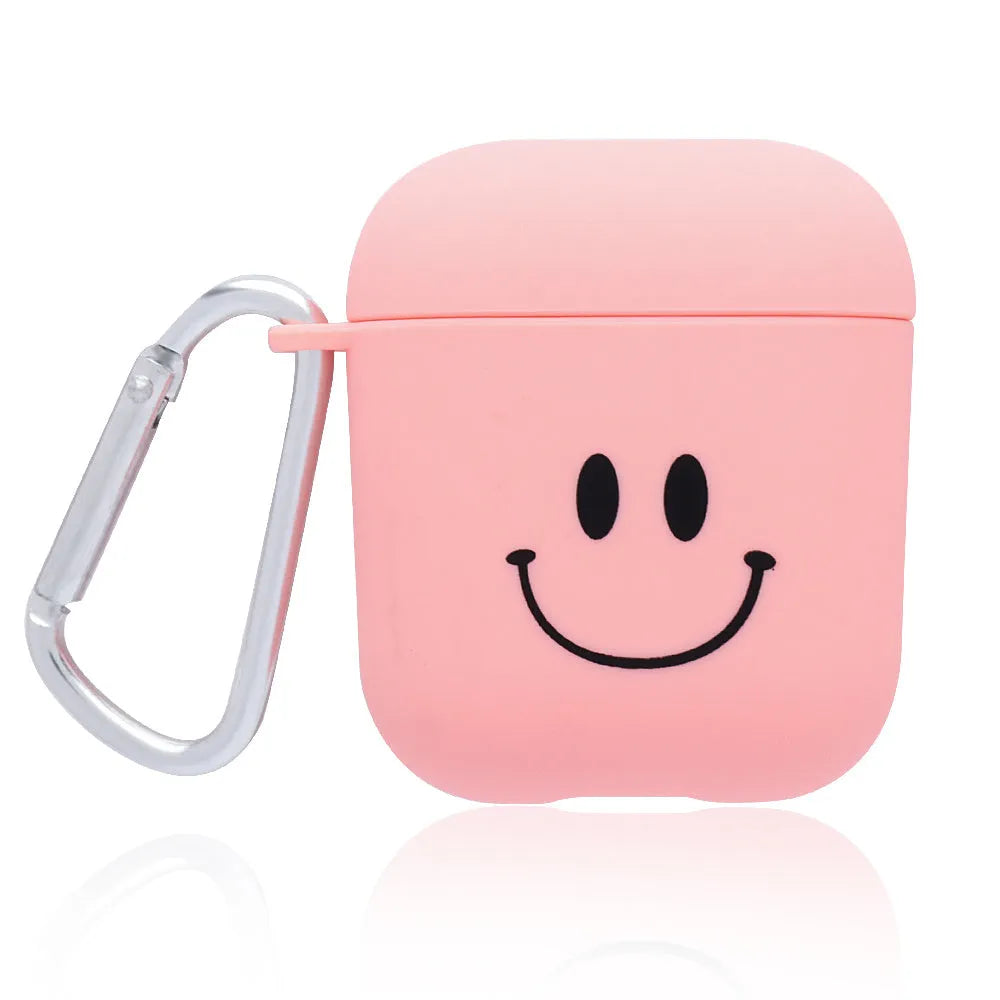 Black and pink Apple AirPods protective case with decorative back cover showing flower and smiley face designs