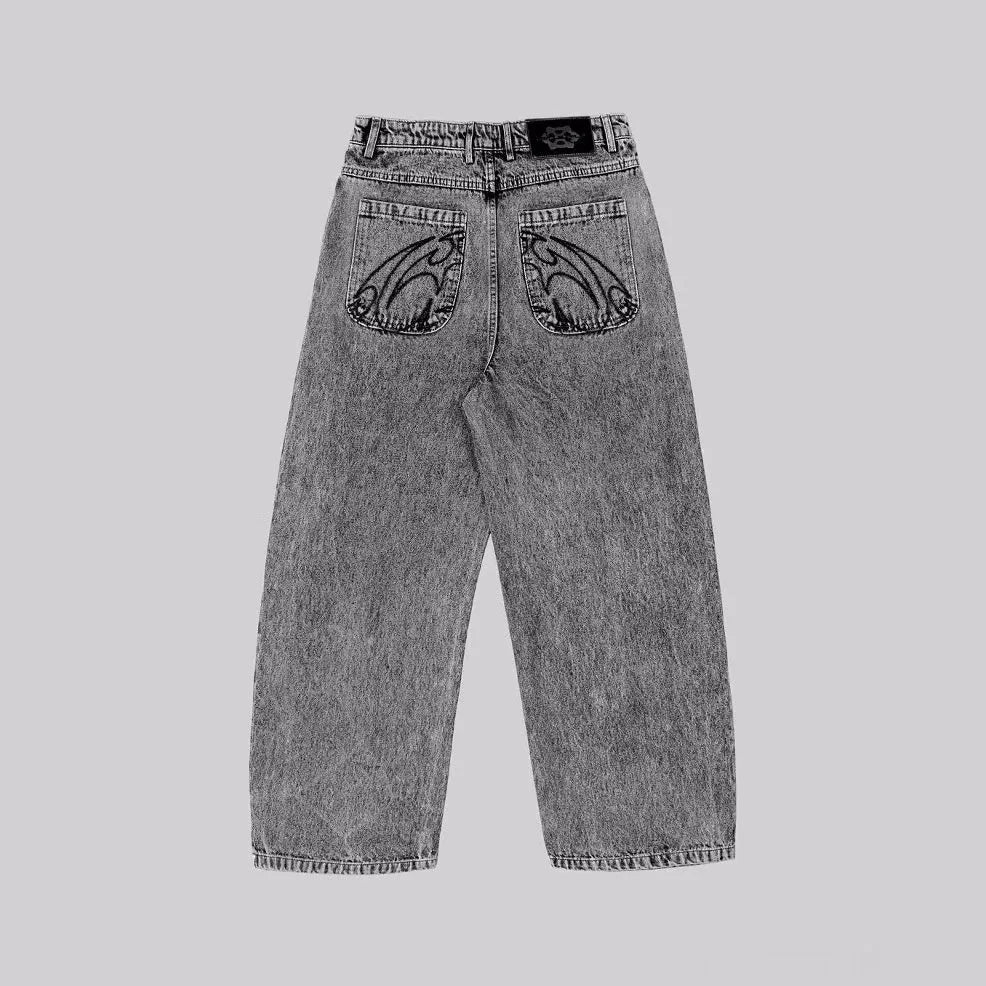 Grey loose fit straight-leg denim trousers with mid-waist design on a hanger