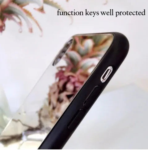 Black iPhone mirror phone case showing reflective glass back, compatible with multiple iPhone models.