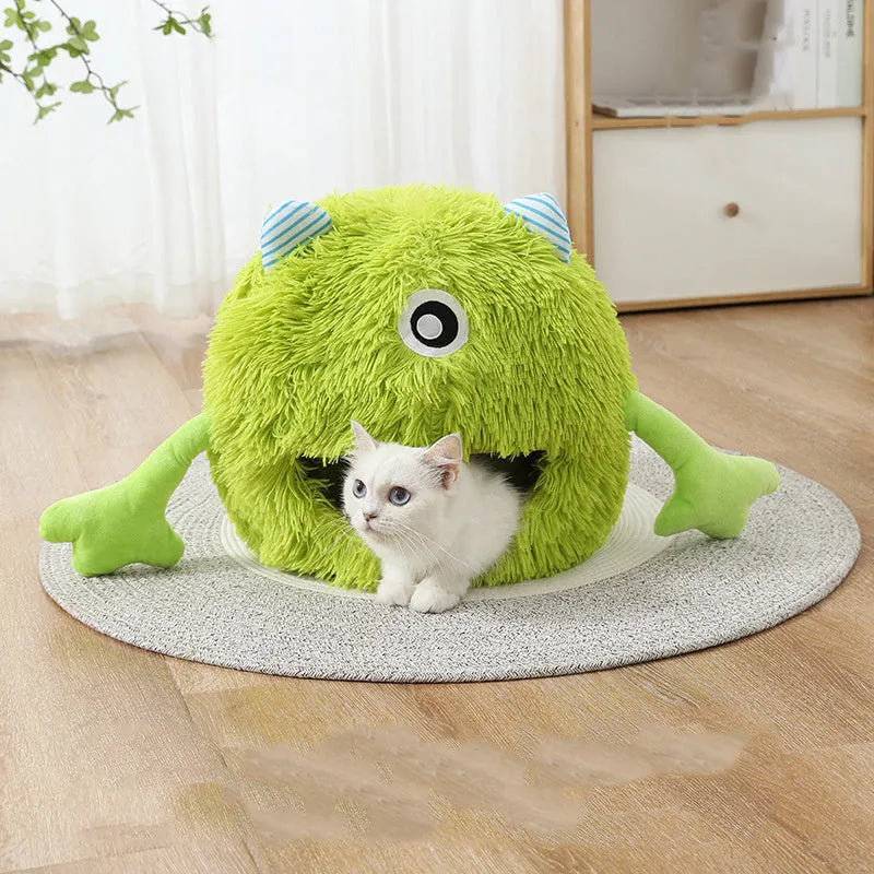 Round fluffy plush cat bed with non-slip base in three size options for indoor cats
