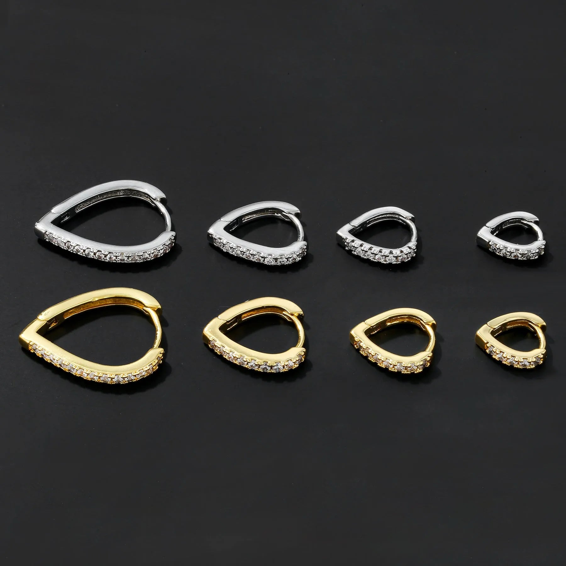 Geometric copper ear clip with love heart design in gold or white electroplated finish
