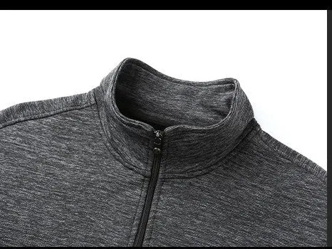 Men's black fitted casual jacket with a stand-up collar and zip front.