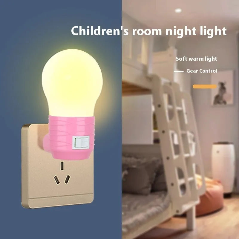 Plug-in bedside baby night light in white, blue or pink with round modern design