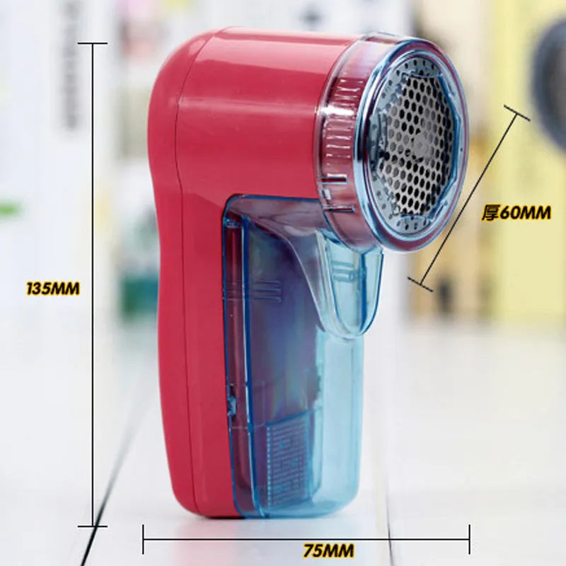 Portable electric clothing lint remover unit in a compact size.
