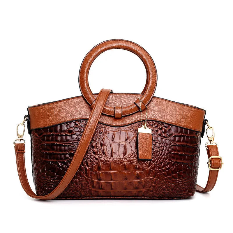 Fabric ladies handbag in multiple colours showing zipper compartment and internal organisation pockets