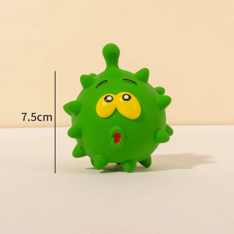 Four colourful squeaky dog balls with cute faces on natural latex rubber with bumpy dental-cleaning surface