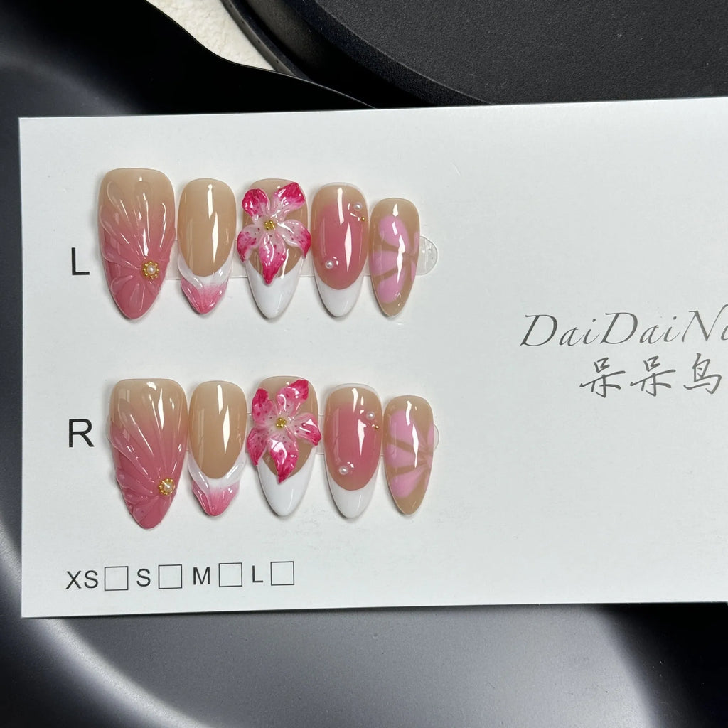 French style artificial nails with three-dimensional fluid ice flower designs on almond-shaped plastic tips