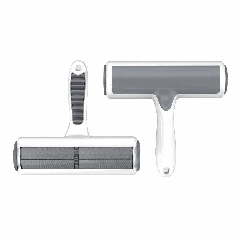 Green manual pet hair lint roller with sticky brush on ABS plastic handle.