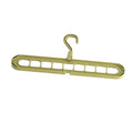 Green plastic nine-hole folding hanger for trousers displayed open and closed.