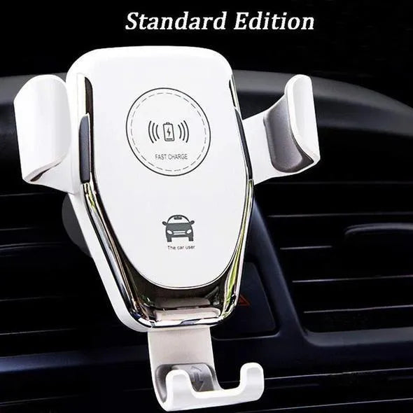 Black wireless car charger with phone clamped, mounted on a car ventilation vent.