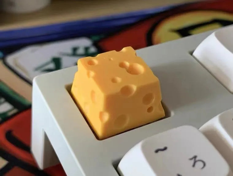 Yellow resin cheese character keycap for mechanical keyboards with Cherry MX compatibility