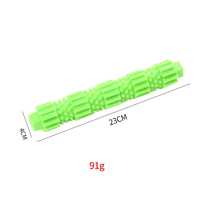 Green and orange rubber dog chew toy for aggressive chewers with treat dispensing hole