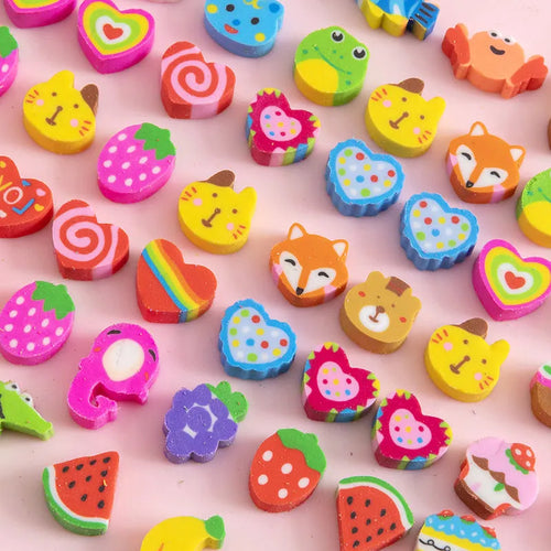 50 colourful cartoon mini erasers in shapes of fruits, animals, and cakes, displayed next to a pearlescent film bag.