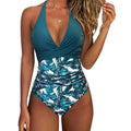 Printed split backless bikini swimsuit with lace-up gather detail in polyester fabric showing floral pattern