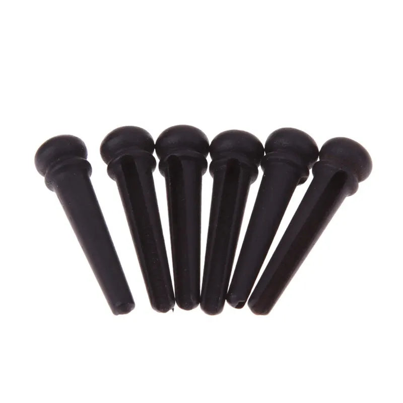 Six matt black ebony guitar string nails with 5.3mm bayonet diameter for folk acoustic guitars