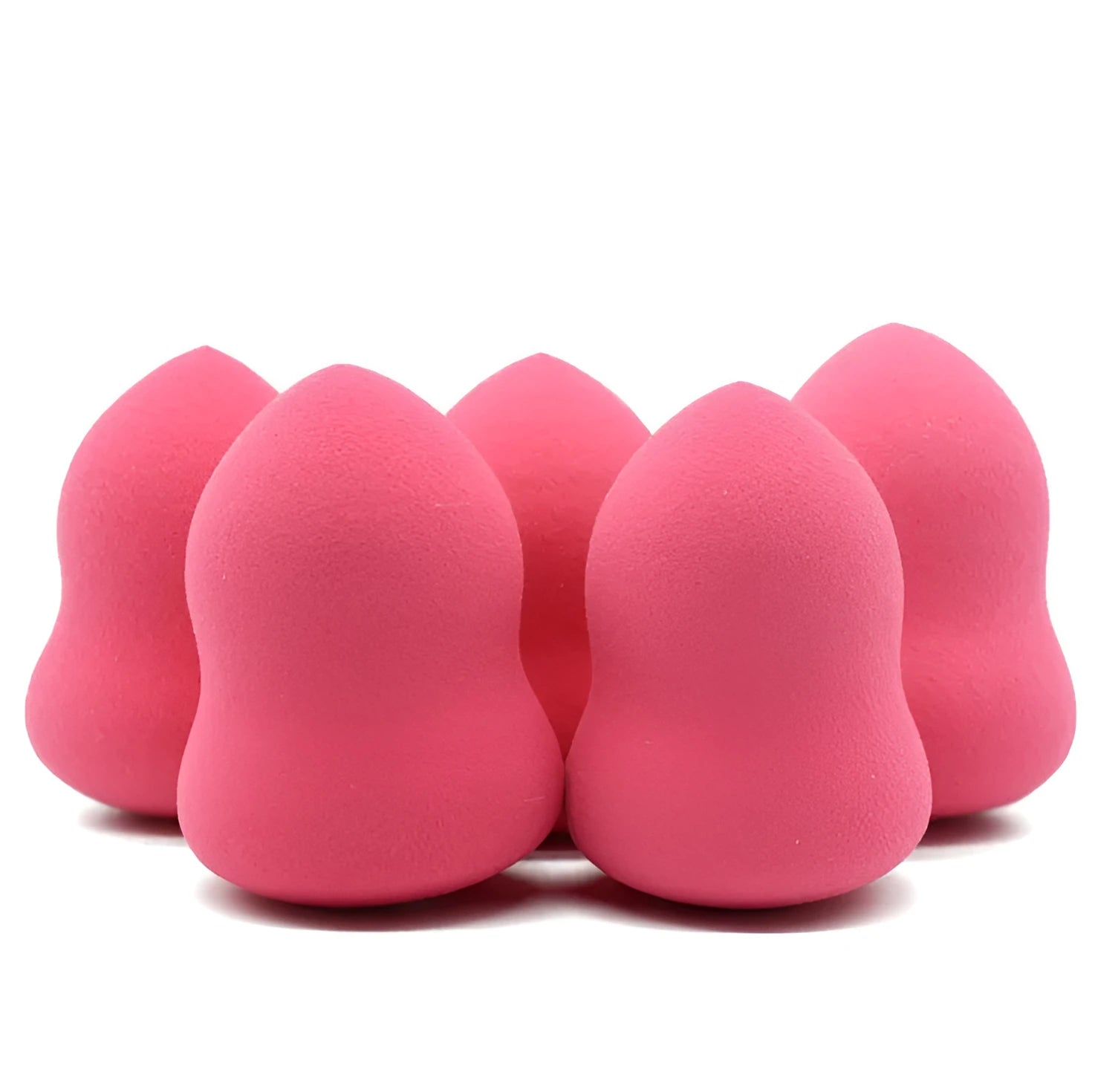 Pink teardrop makeup blending sponge on a plain background.