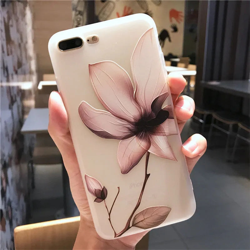 Black embossed flower design on a slim TPU iPhone case for iPhone 11.
