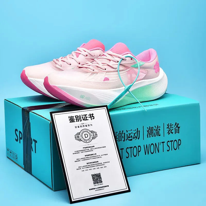 Low-top racing sneaker with carbon plate technology in Glacier colour, showing front lace-up design.