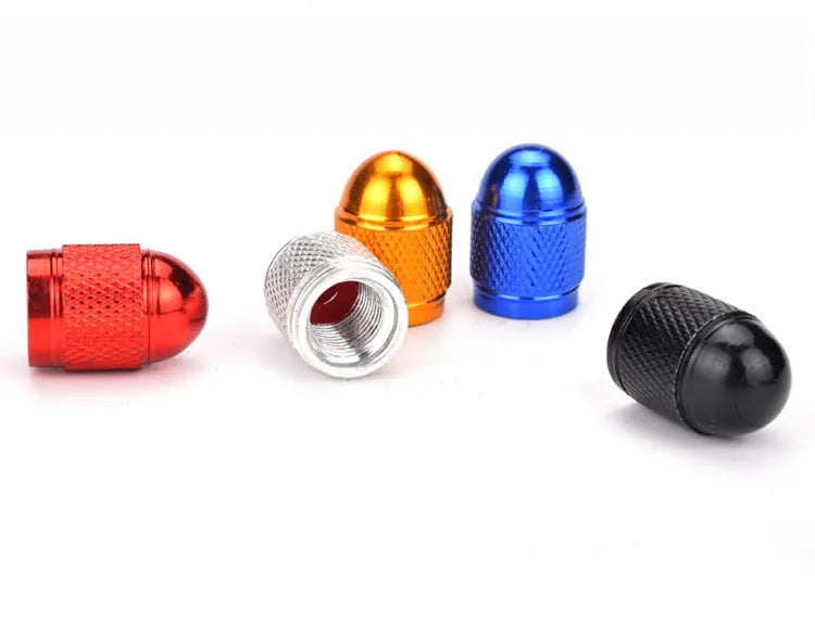 Aluminium alloy mountain bike tyre valve cap shown in five colour options: black, blue, gold, silver, and red