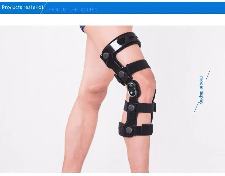 Black adjustable anterior ligament knee support with straps, shown on a leg.