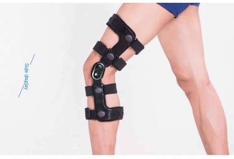 Black adjustable anterior ligament knee support with straps, shown on a leg.