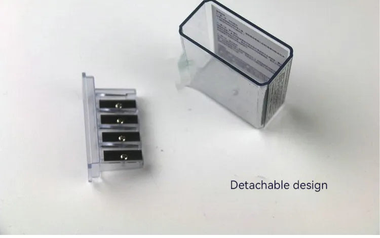 Geometric plastic pencil sharpener with four colour-coded holes and integrated screwdriver tool
