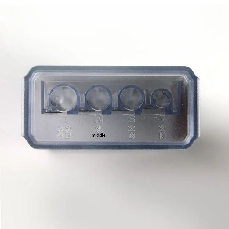 Geometric plastic pencil sharpener with four colour-coded holes and integrated screwdriver tool