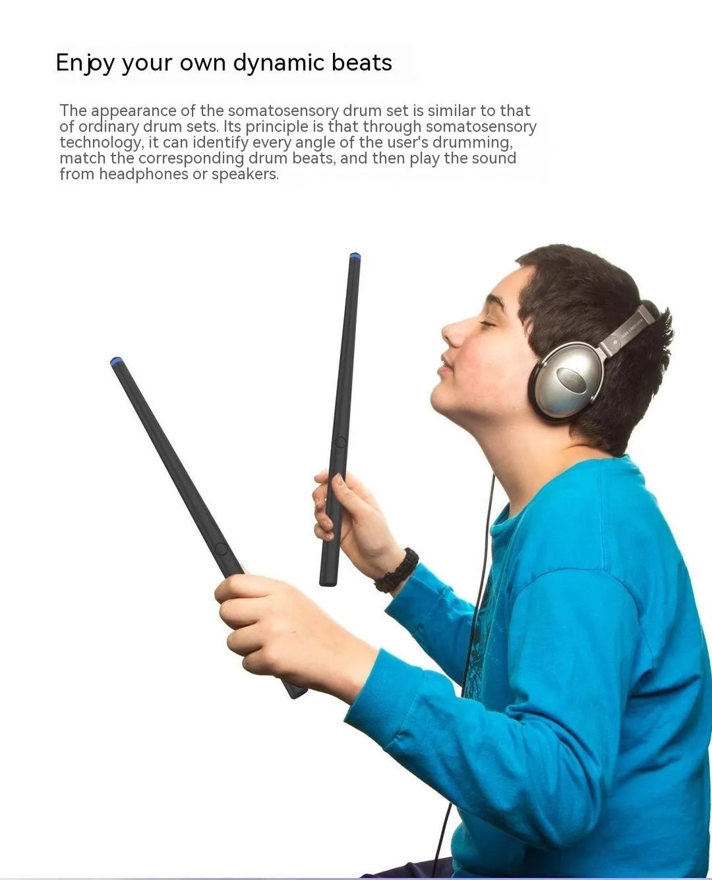 Black somatosensory air drum kit host unit with two drumsticks on a table, showing LED lights.